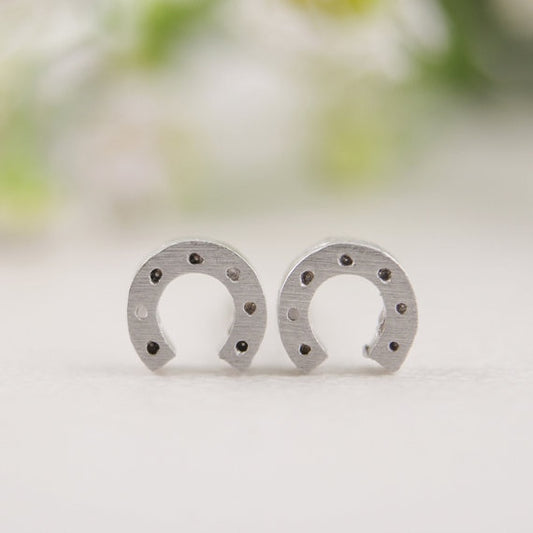 Boucle d'oreille cheval couleur or