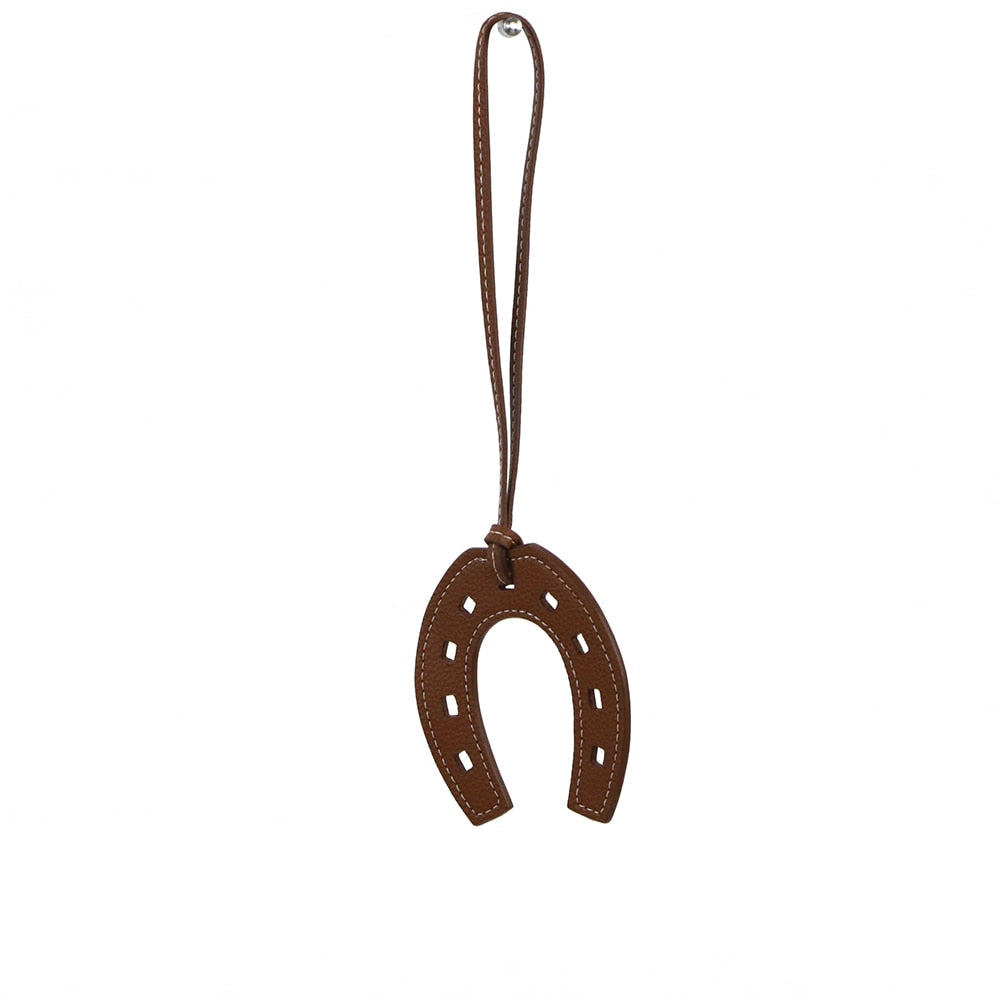 Porte clé fer à cheval en cuir