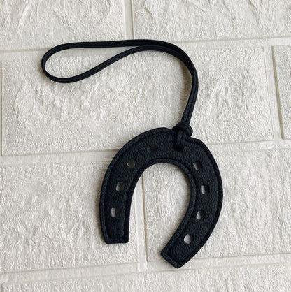 Porte clé fer à cheval en cuir