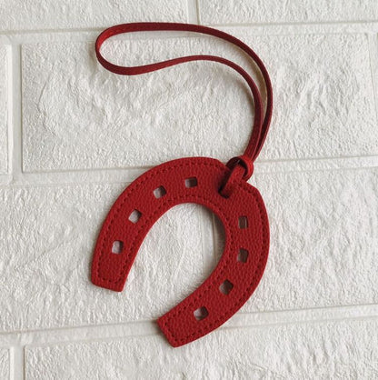 Porte clé fer à cheval en cuir