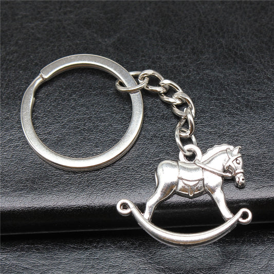 Porte clé cheval à bascule