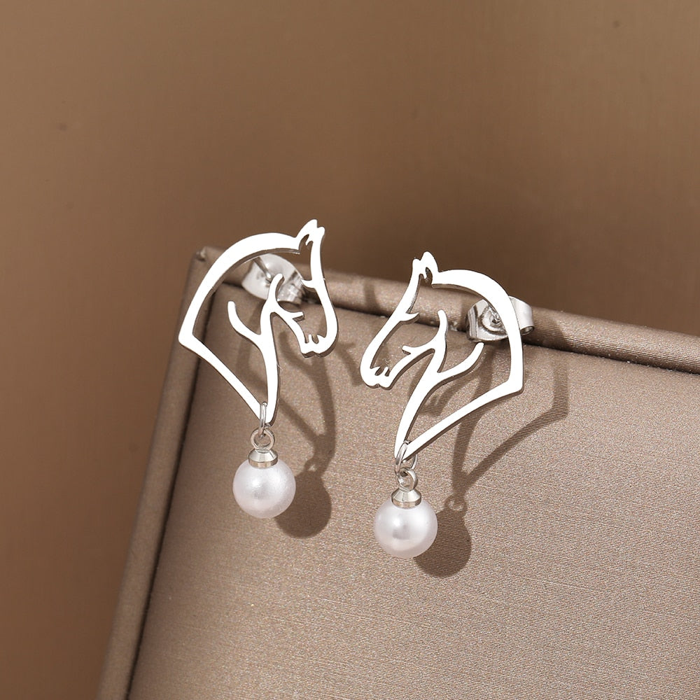 Boucles d'oreilles cheval avec perle