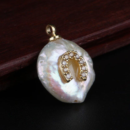 pendentif fer cheval porte-bonheur