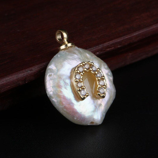pendentif fer cheval porte-bonheur