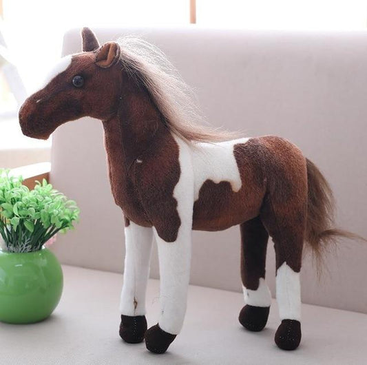 petit cheval en peluche